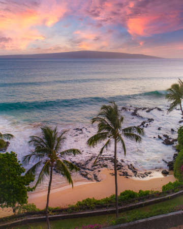 Beach cove at sunset on Maui, Hawaiiの写真素材
