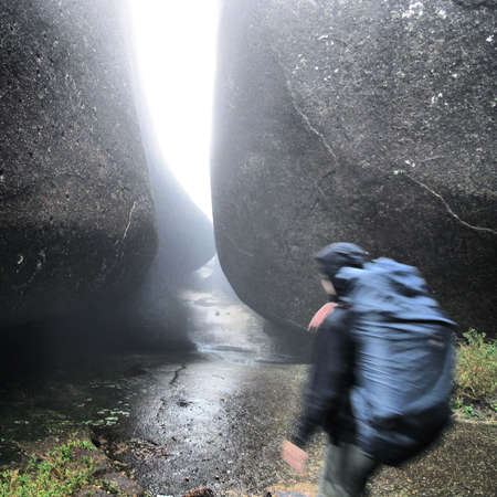 A woman carries a backpack during a 3 day trek across the Serra dos Org? os os, a mountain range 70km from Rio de Janeiro cityの写真素材