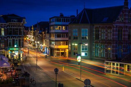 Trails of light on a Dutch city roadの写真素材