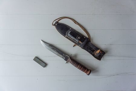 Vintage hunting knife with sharpening steel