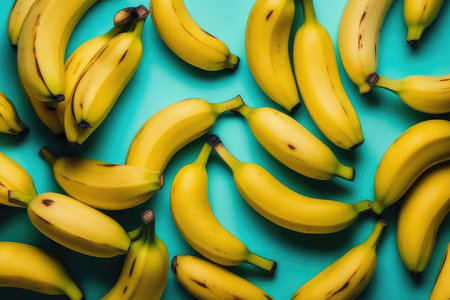Bananas on turquoise background. Flat lay, top view.の素材