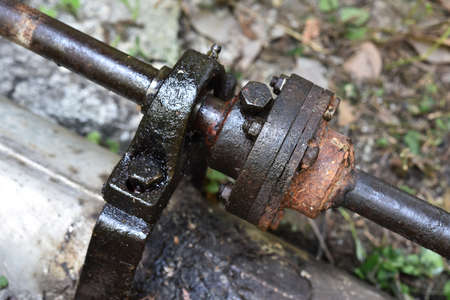 Steel flexible flange connector with shaft of water pump with blurred background.の写真素材