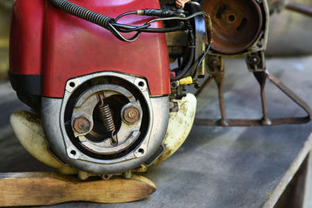 old and dirty clutch system of a brush cutters machine