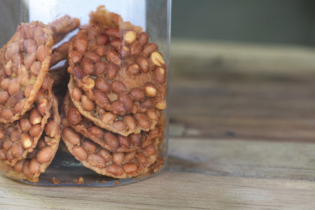 Thai fried peanut cookies in plastic bottleの写真素材