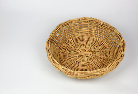 Rattan wicker basket isolate on the white background . handmadeの写真素材