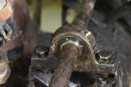 Ball bearing of water pump with dirty grease . Spherical roller bearing is dirty with grease stains .の写真素材
