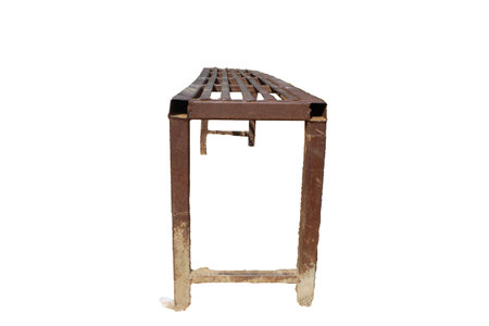 Brown Iron bench with a decorative ornate metal legs and armrests, isolated on a white background in Nepalの写真素材