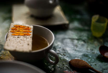 Honey spread on toast on the breakfast tableの写真素材