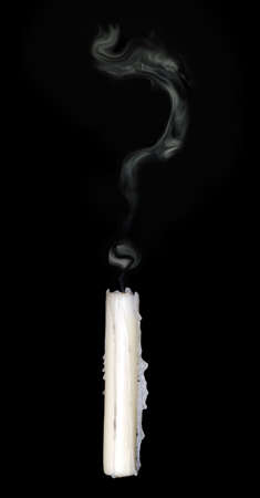 candle smoke makes the shape of question mark の写真素材