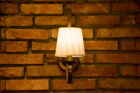vintage lamp on the brick wallの写真素材