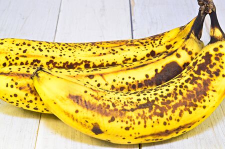 3 Ripe bananas on white backgroundの写真素材
