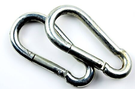 Two silver carabiner on white background