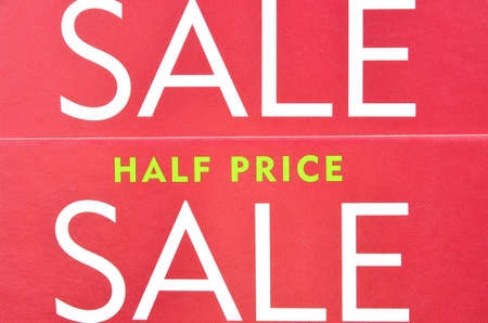 Sale logo and half price on cardboardの写真素材
