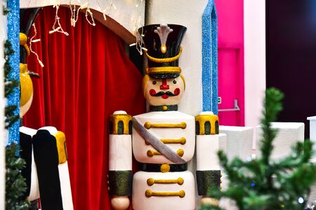 Christmas scene with Holiday Decorations, Tree & Toys display at shopping center for public view