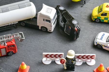 Road accident crash  shows with toys, lorry accident, broken toys lorryの写真素材