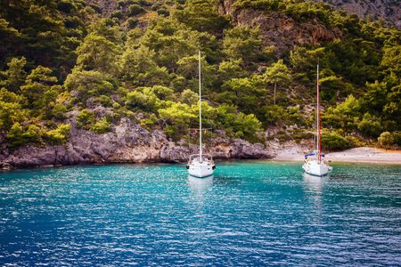 Two yacht moored at bay in Oludeniz Turkey