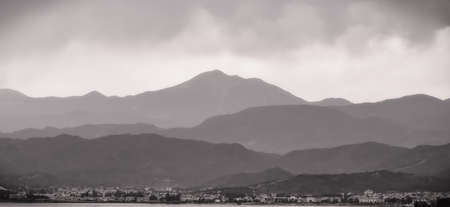 Misty mountains landscape in Fethiye Turkey, used photo effectsの写真素材