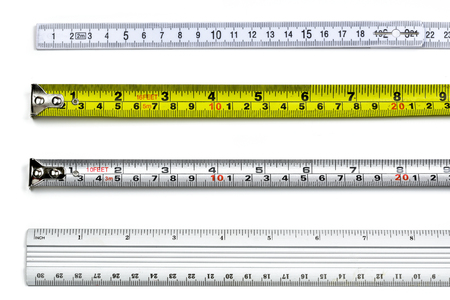 Four kinds of tape measure on a white background and different angle