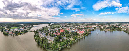 Photo taken from drone, panoramic view of Ilawa town in Poland and surrouding area, Jeziorak lake.の写真素材