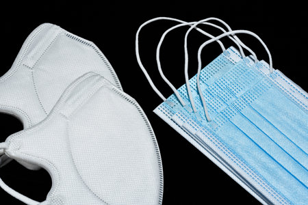 Anti virus protection mask standart to prevent corona COVID-19 infection on black background.