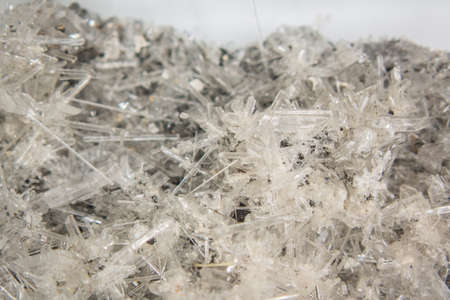 Selenite crystal needles on rockの写真素材