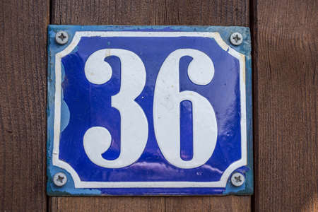 antique blue white house number in enamelの写真素材