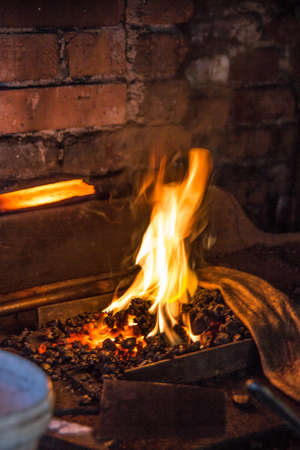Coal fire and red-hot steel in the smithy