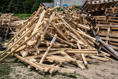 brown beams and boards as waste wood