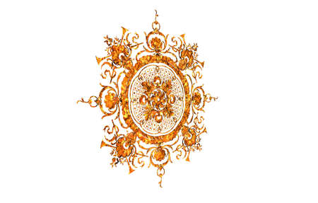 Round metal emblem with numerous embellishmentsの写真素材