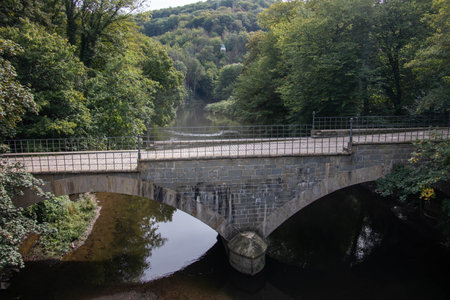 old stone arch bridge over the Lenne in Solingenの写真素材