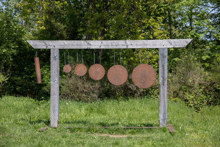wooden Japanese gate with metallic sound disksの写真素材