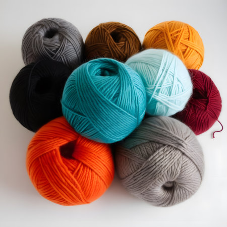 colored balls of wool for knitting and crochetingの素材