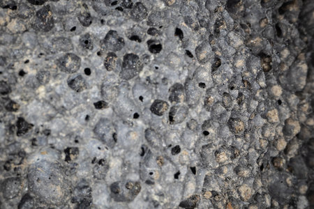 gray porous pumice stone as a volcanic igneous rock close upの写真素材