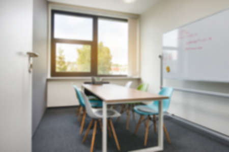 Office background - blurred and defocused - ideal for business presentation background textspaceの写真素材