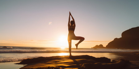 fitness, sport, yoga and healthy lifestyle concept - excercising on the beachの素材