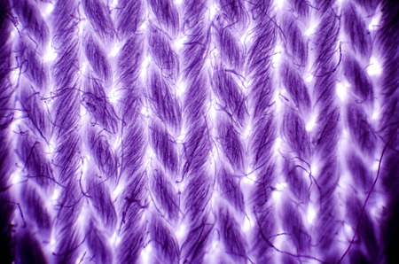 Cotton textile under microscope, light micrograph, magnification 40xの写真素材