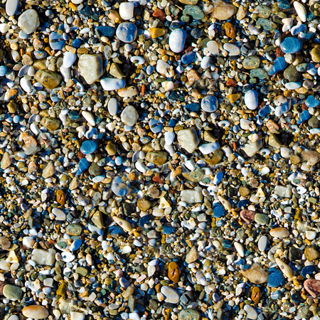 Seamless colorful sea stones background. Colorful pebbles textureの写真素材