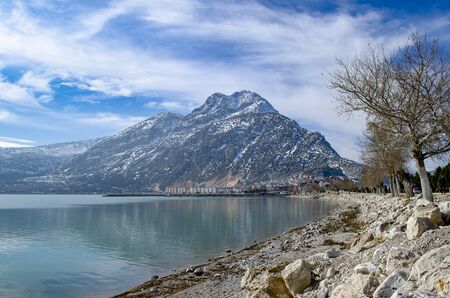 Turkey, Isparta province, beautiful Egirdir lake and the Needle mountain in winterの写真素材