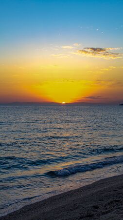 Beautiful sunset with clouds over the Mediterranean Seaの写真素材