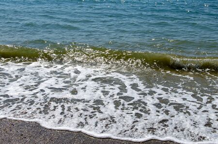 Sea wave and foam, relaxation nature backgroundの写真素材