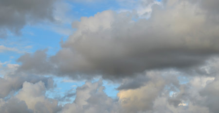 Blue sky with gray clouds before rain