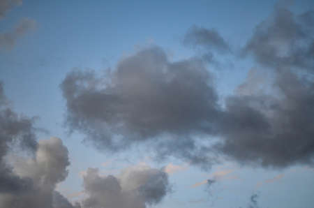 Sky with dark gray clouds before rainの写真素材
