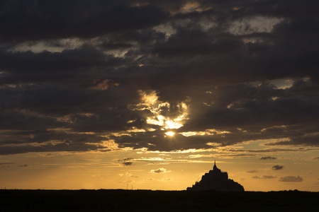 Sunset at Mount Saint Michel in Normandy Franceの写真素材