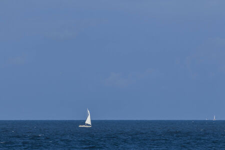 Sailboat sailing at the seaの写真素材
