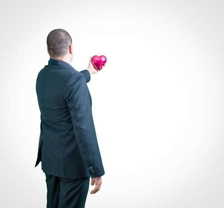 a young businessman with a romantic heartの写真素材