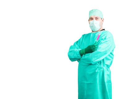a surgeon in uniform with mask and glovesの写真素材