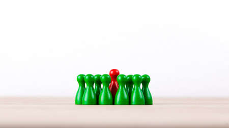 Raised figure in a group of gameboard figuresの写真素材