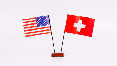 Flags of the two Nations Switzerland USA against a white backgroundの写真素材