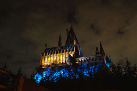 OSAKA, JAPAN - AUGUST 12, 2018: Night view of Hogwarts Castle. The Wizarding World of Harry Potter...