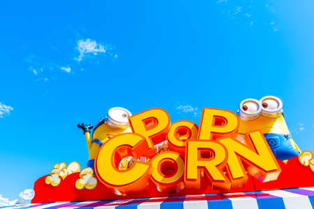 OSAKA, JAPAN - AUGUST 12, 2019: "HAPPY MINION CART" shop, selling Pop corn, located in United Studios JAPAN (USJ). Minions are famus characters from Destroy Me animation.のeditorial素材